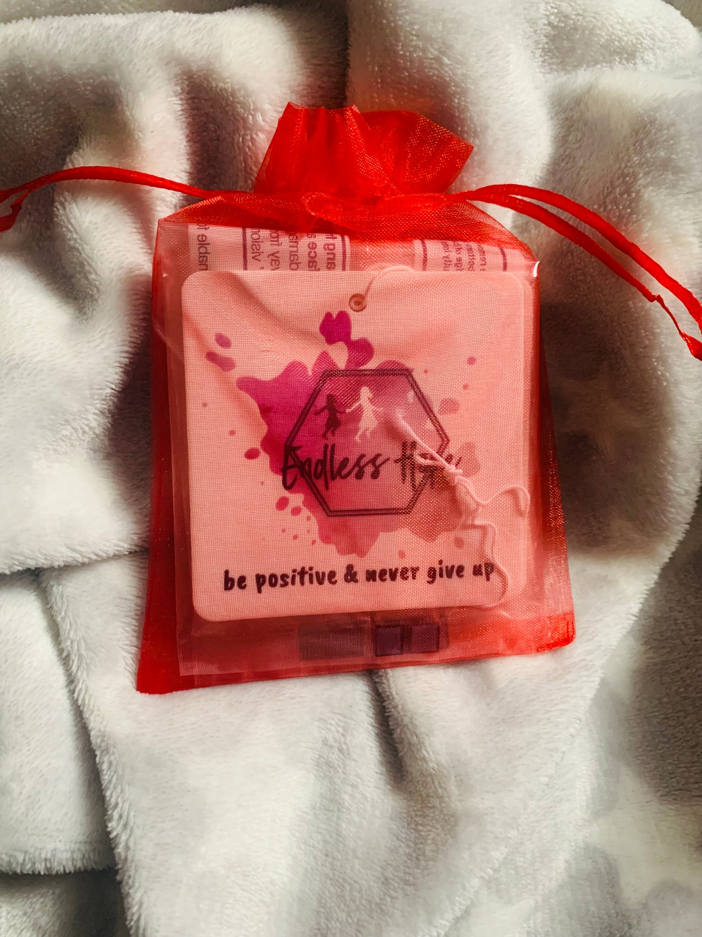4 car/home double sided air fresheners, presented in a red gift bag