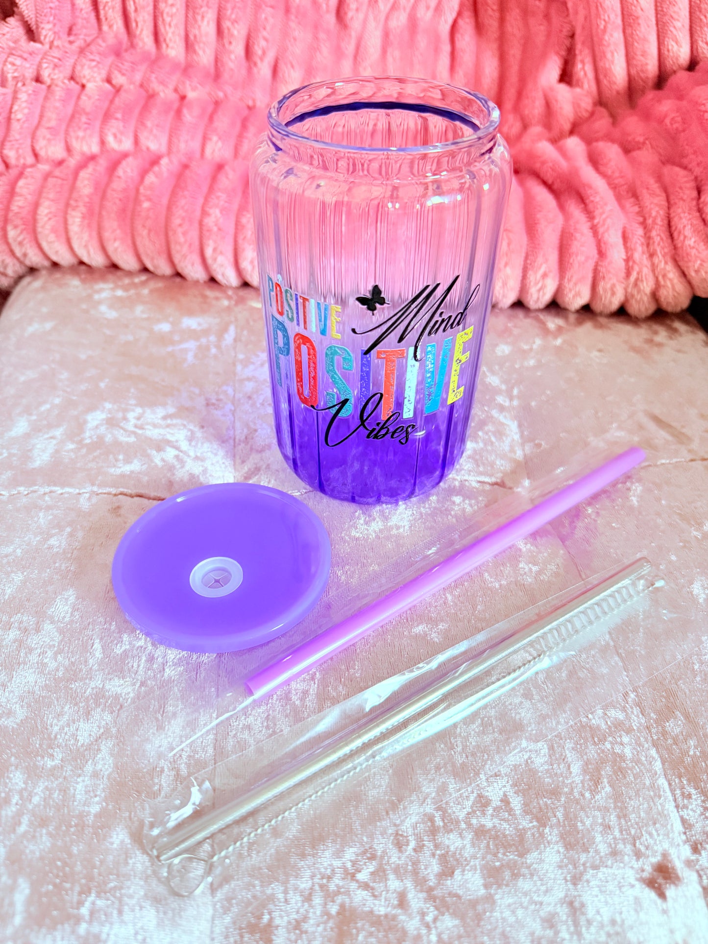 Drinking glass with straws, choice of designs.