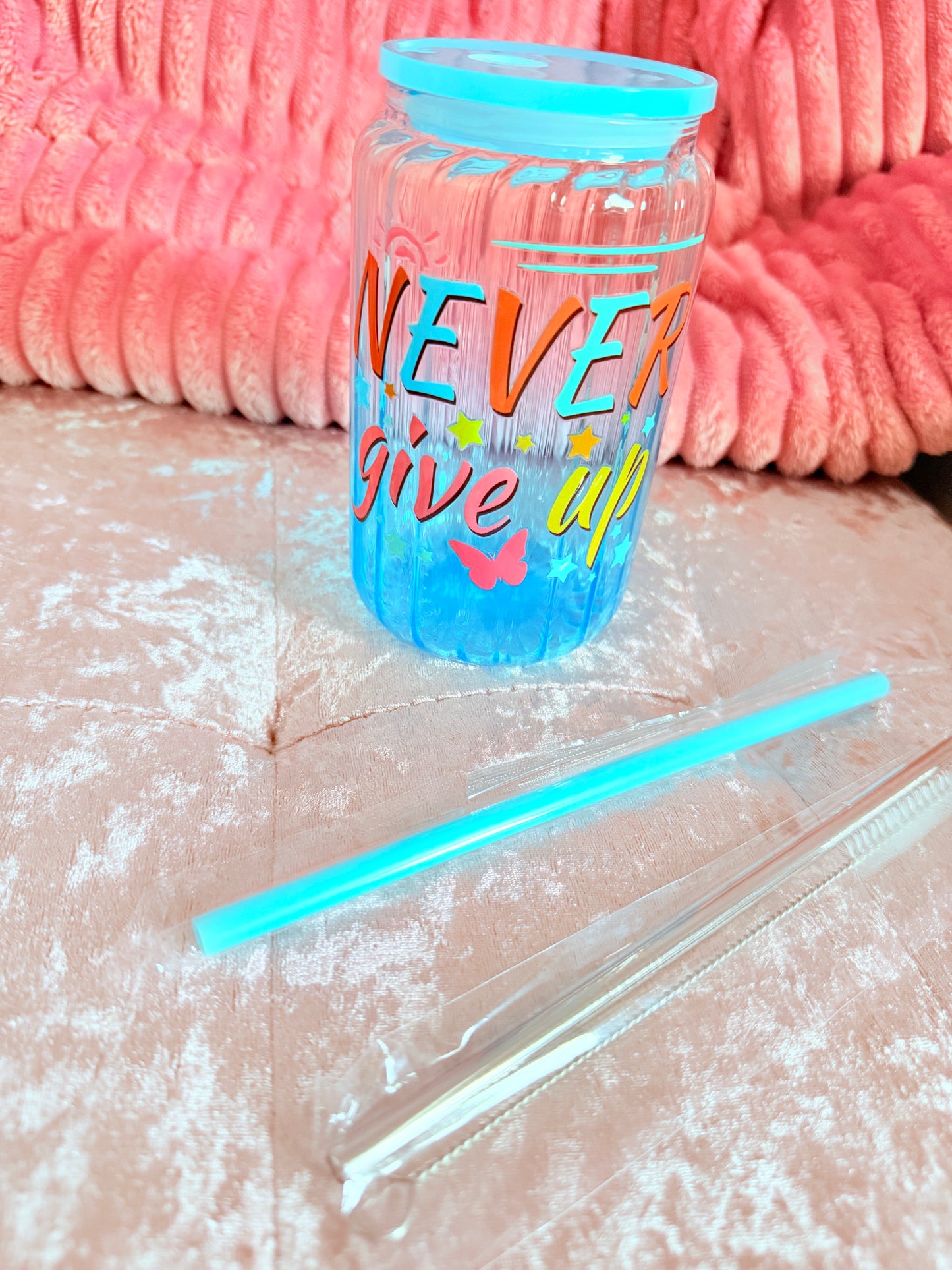 Drinking glass with straws, choice of designs.