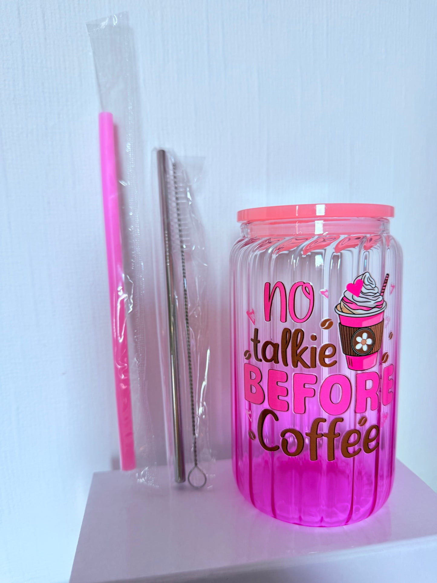Drinking glass with straws, choice of designs.