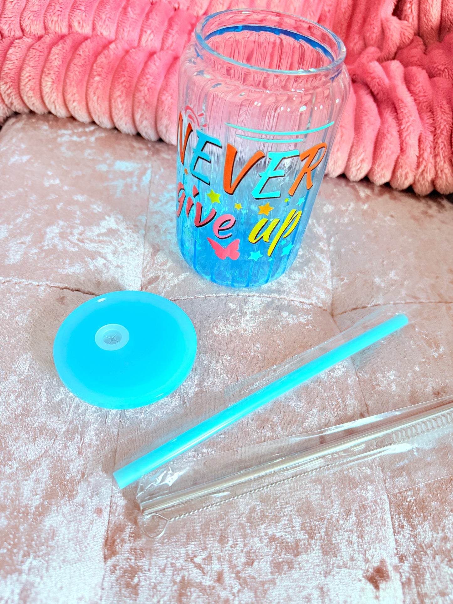 Drinking glass with straws, choice of designs.