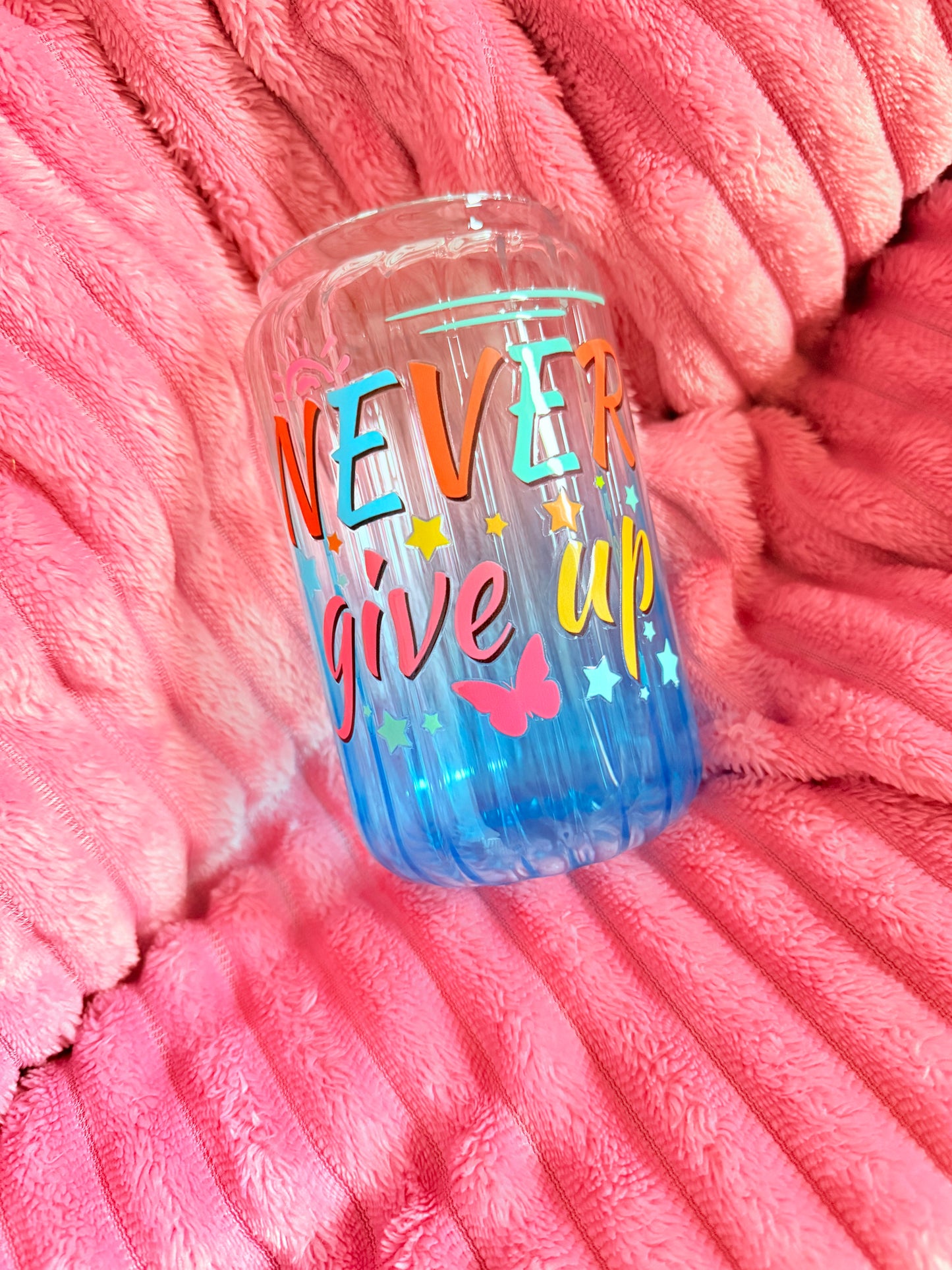 Drinking glass with straws, choice of designs.