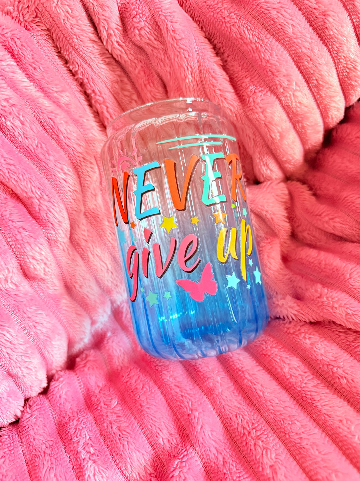 Drinking glass with straws, choice of designs.